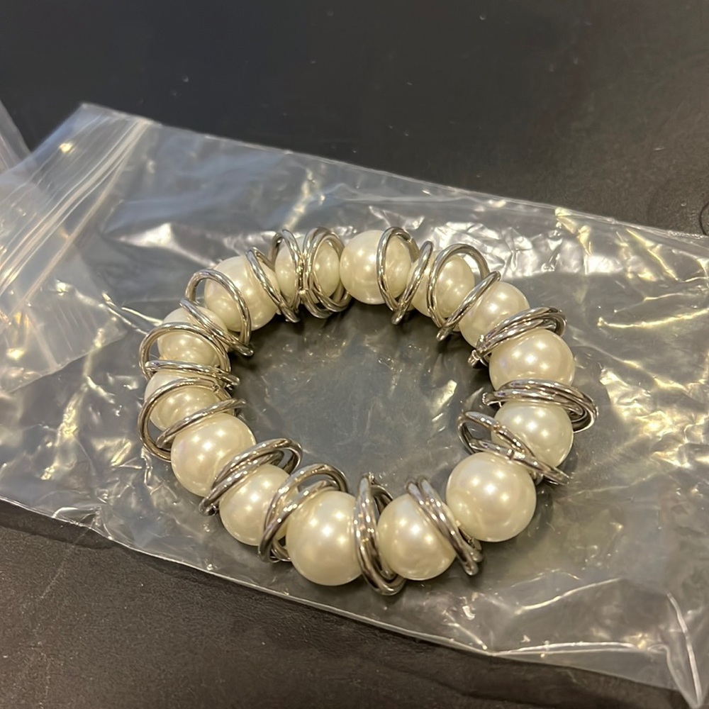 Brand new pearl and silver bracelet.